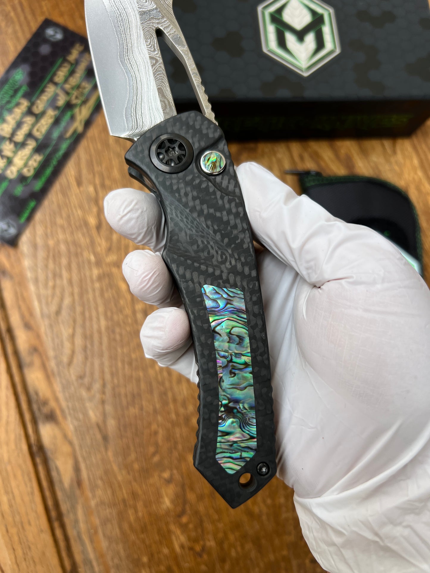 Heretic Knives Pariah Custom M/A Button Lock Carbon Fiber & Abalone Inlay w/ Vegas Forge Wood Grain San Mai Damascus