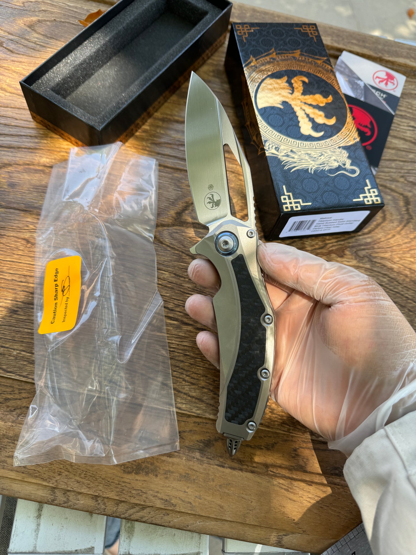 Microtech Matrix Manual Folding Knife 3.77" M390 Hand Rubbed Modified Sheepsfoot Plain Blade, Titanium Handles with Carbon Fiber Inlays, Reversible Clip, Frame Lock - 165C-4CFITI