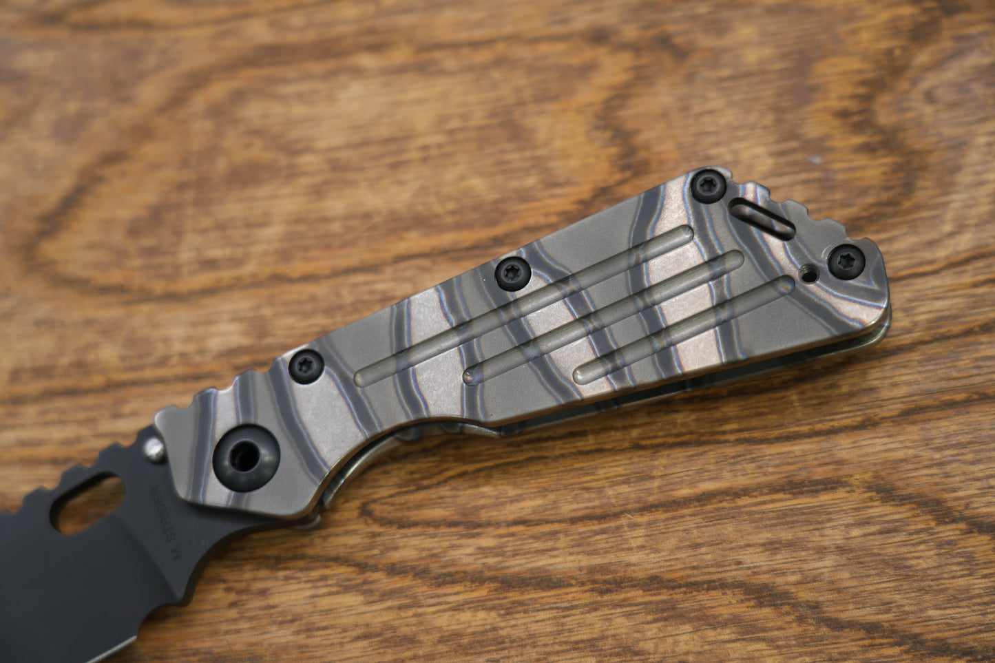 strider smf magnacut Titanium handle