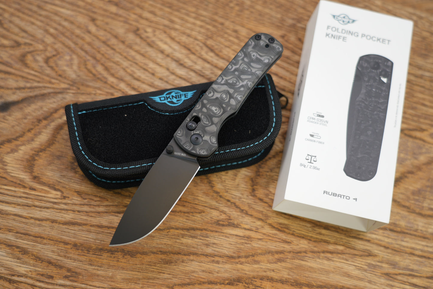 Olight Limited Edition Oknife Rubato 4 Rail Lock Folding Knife 3.04" CPM-S35VN Black Drop Point Blade, Carbon Fiber Handles, AXIS/Crossbar Lock - OLIGHT-RUBATO-4-CF